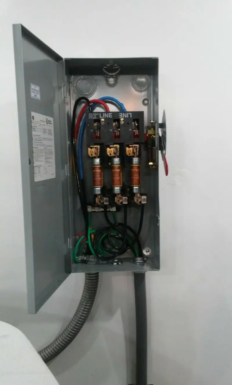 Three-phase disconnect switch installed for Smoke Detector Installation in Columbine
